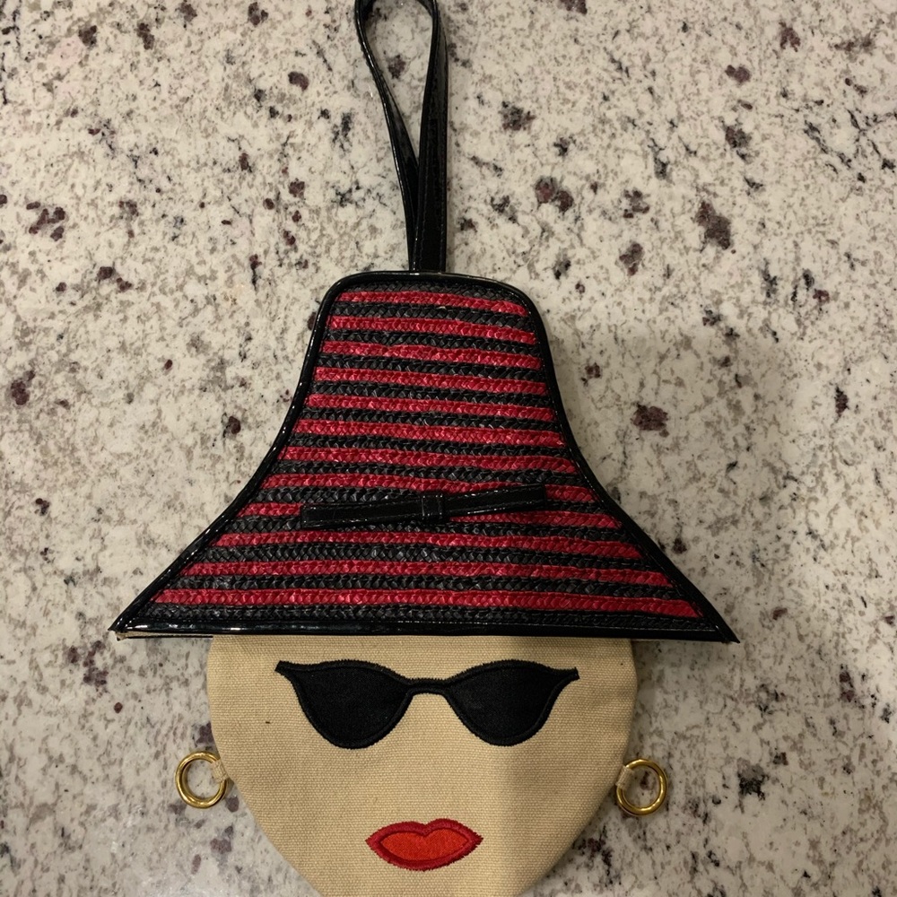 Lulu guinness london face wristlet‎ bag